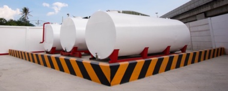 Waste storage tanks in a bunded area